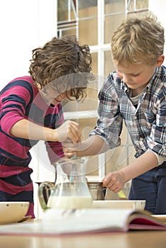 Kids whisking batter