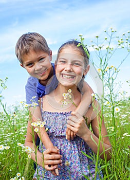 Kids with wild spring flowers