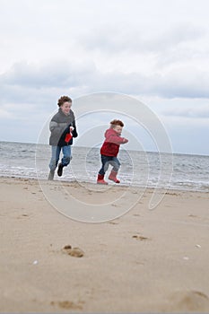 Kids at winter beach