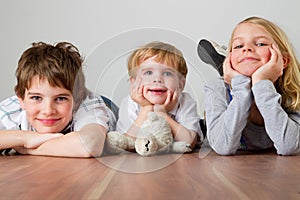 Kids on the wodden floor photo