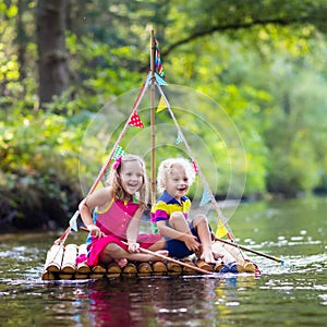 Kids on wooden raft