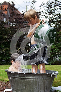 Kids in zinc bathtub