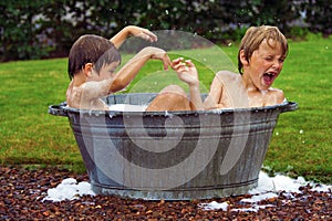 Kids in zinc bathtub