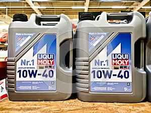 Kiel, Germany - 11 February 2023: Two canisters of Liqui Moly brand motor oil