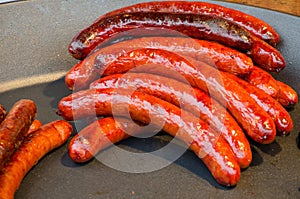 Kielbasa hot sausage street food in pan