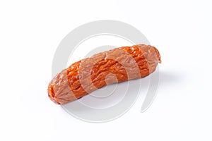 Kielbasa sausage on white background