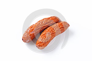 Kielbasa sausages on white background