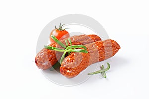 Kielbasa sausages on white background