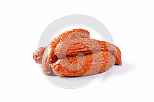 Kielbasa sausages on white background