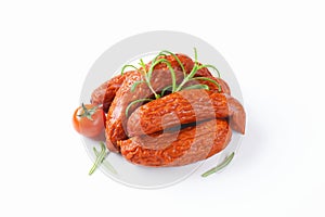 Kielbasa sausages on white background