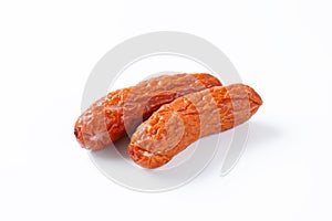 Kielbasa sausages on white background