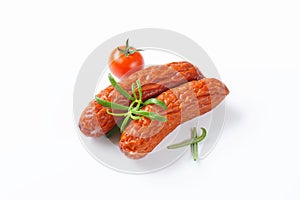 Kielbasa sausages on white background