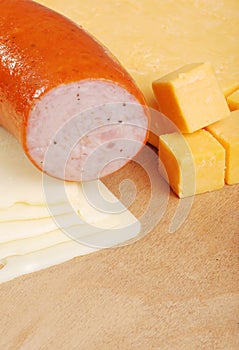 Kielbasa with two types of cheese photo