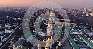 Kiev city center in morning lights. Dnipro river and Sophia Cathedral of Kiev, Ukraine. Aerial drone shot.