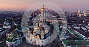 Kiev city center in morning lights. Dnipro river and Sophia Cathedral of Kiev, Ukraine. Aerial drone shot.