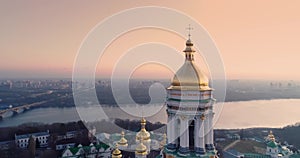 Kiev city center in morning lights. Dnipro river and Sophia Cathedral of Kiev, Ukraine. Aerial drone shot.