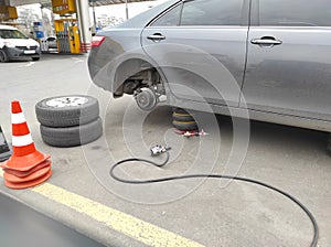 KIEV, UKRAINE - April 13, 2021: replacing winter tires with summer tires