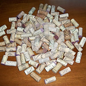 Closeup pattern background of many different wine corks with dates.