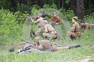 Kiev, Ukraine - on May 09, 2018: People in uniform of fighters of the Red Army of World War II conduct a battle