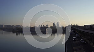 Kiev, Ukraine. Metro bridge across the Dnieper River with train and cars on it