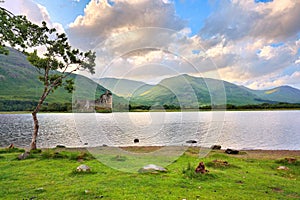 Kilchurn Castle on Lock Awe in the highlands of Scotland near sunset