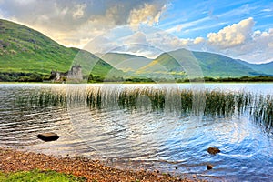 Kilchurn Castle on Lock Awe in the highlands of Scotland at sunset