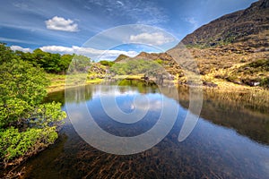 Killarney scenery with mountains reflected in lake