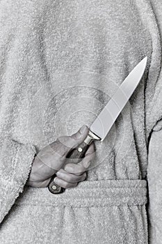 Killer woman with a knife. Violence aggression. Criminal murderer