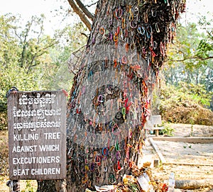 Killing tree against which executioners beat children