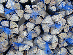 Kiln dried logs in netted bags