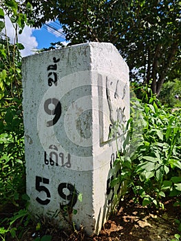 kilometer mark on 106 road, lamphun, thailand.