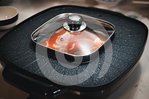 Kimchi soup in pot in the middle