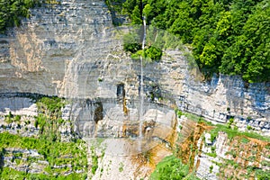 The Kinchkha waterfall in the canyon of the river Okatse. Rest in Georgia. High waterfall in the Imereti region. Rocky