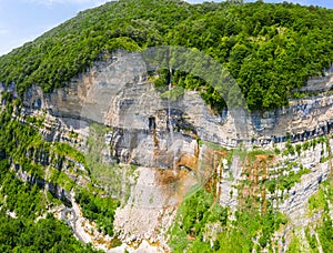 The Kinchkha waterfall in the canyon of the river Okatse. Rest in Georgia. High waterfall in the Imereti region. Rocky