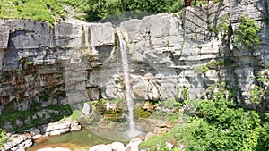 The Kinchkha waterfall in the canyon of the river Okatse. Rest in Georgia. High waterfall in the Imereti region. Rocky