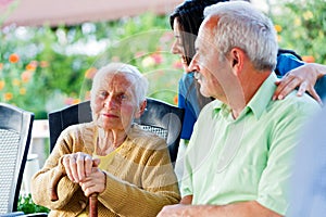 Kind Elderly Lady with Visitors