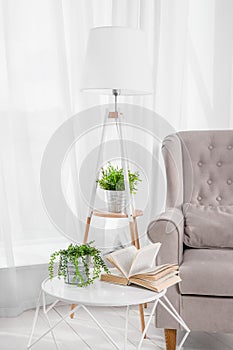 Kind of empty room, table and book