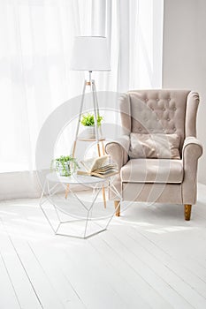 Kind of empty room, table and book