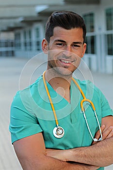 Kind health care worker close up with arms crossed