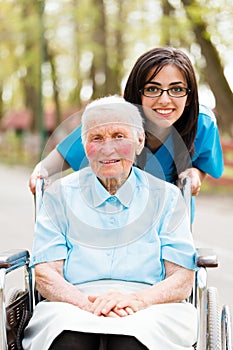 Kind Nurse and Elderly Lady