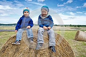 Children on hay bales