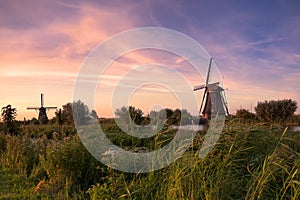 Kinderdijk windmills in the netherlands on sunset