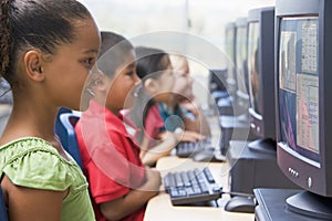 Kindergarten children learning to use computers