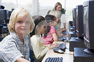 Kindergarten children learning to use computers