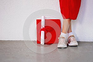 Close-up of Kindergartner`s Shoes Next to Diploma photo