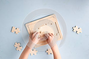 boy playing puzzle photo