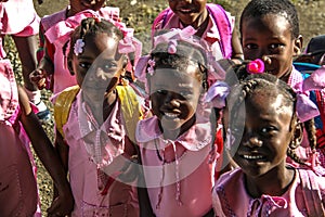 Kindergartners gather for recess during school day in Haiti.