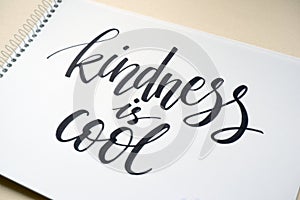 Kindness is cool, calligraphic background