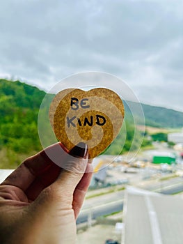 Kindness reminder in the shape of a heart photo