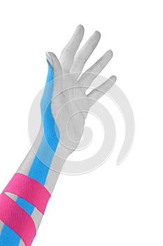 Kinesio tape on female hand.